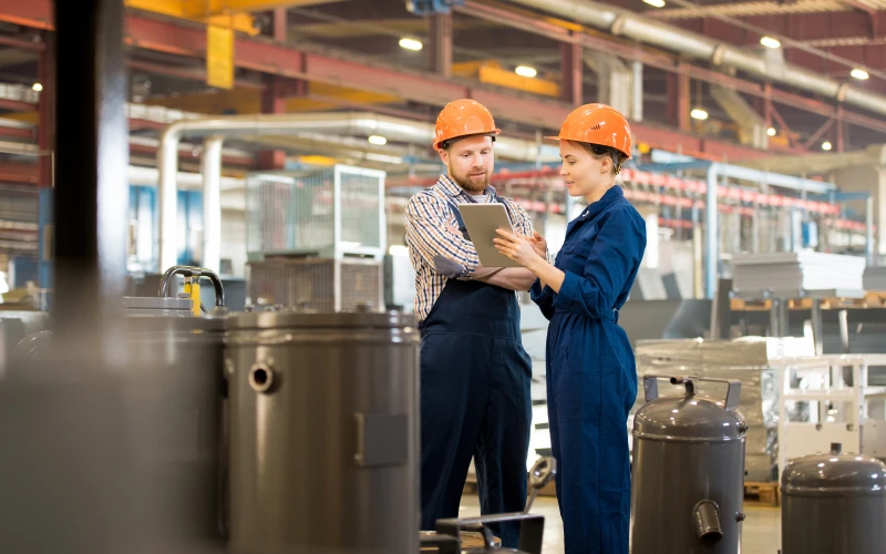 Industrial workers accessing visual technical knowledge on a tablet