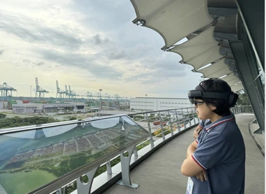 AR-tour participant viewing Port of Tanjung Pelepas facilities through a headset