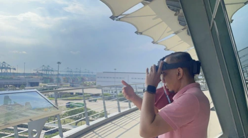 Visitor wearing an AR headset overlooking Port of Tanjung Pelepas during the facility tour